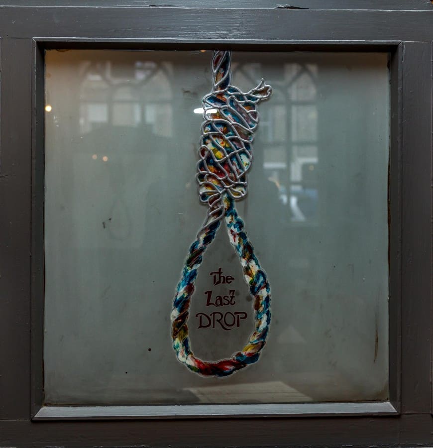The Last Drop, Grassmarket, Edinburgh. Hangman's noose in glass pane.
